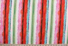 Load image into Gallery viewer, Wind Driven is a multi use fabric featuring bright colorful stripes in red, pink, green, white, black, turquoise and gray.  It is perfect for any project where the fabric will be exposed to the weather.  Able to resist stains and water and can withstand 500 hours of direct sunlight  Uses include cushions, tablecloths, upholstery projects, decorative pillows and craft projects. This fabric has a slightly stiff feel but is easy to work with.  
