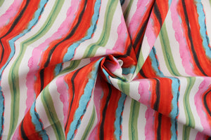 Wind Driven is a multi use fabric featuring bright colorful stripes in red, pink, green, white, black, turquoise and gray.  It is perfect for any project where the fabric will be exposed to the weather.  Able to resist stains and water and can withstand 500 hours of direct sunlight  Uses include cushions, tablecloths, upholstery projects, decorative pillows and craft projects. This fabric has a slightly stiff feel but is easy to work with.  