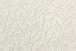 This lace features a floral design in cream a with a stretch