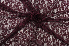 Load image into Gallery viewer, This lace features a floral design with glitter in a plum purple with a stretch. 
