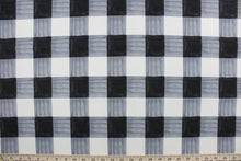 Load image into Gallery viewer, Painterly Plaid is perfect for outdoor environments.  It features a classic buffalo check pattern in the shades of black and white, and has a durability rating of 13,000 double rubs. This upholstery fabric is stylish, sturdy, and sure to stand the test of time.  Uses include cushions, tablecloths, upholstery projects, decorative pillows and craft projects. This fabric has a slightly stiff feel but is easy to work with.  
