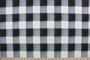 Painterly Plaid is perfect for outdoor environments.  It features a classic buffalo check pattern in the shades of black and white, and has a durability rating of 13,000 double rubs. This upholstery fabric is stylish, sturdy, and sure to stand the test of time.  Uses include cushions, tablecloths, upholstery projects, decorative pillows and craft projects. This fabric has a slightly stiff feel but is easy to work with.  