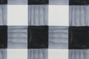 Painterly Plaid is perfect for outdoor environments.  It features a classic buffalo check pattern in the shades of black and white, and has a durability rating of 13,000 double rubs. This upholstery fabric is stylish, sturdy, and sure to stand the test of time.  Uses include cushions, tablecloths, upholstery projects, decorative pillows and craft projects. This fabric has a slightly stiff feel but is easy to work with.  