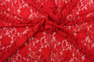 This lace features a floral design in a true red with a stretch. 