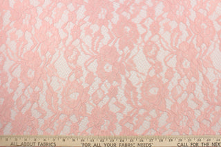 This net lace features a floral design in a beautiful pink with a stretch. 
