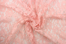 Load image into Gallery viewer, This net lace features a floral design in a beautiful pink with a stretch. 
