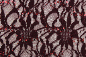 This lace features a floral sequin design in a  rich dark plum  with a stretch. 