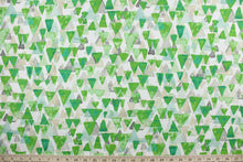 Load image into Gallery viewer,  Reef Point features layered cascading triangles in shades of green, tan and gray against a white background.  It is perfect for any project where the fabric will be exposed to the weather.  Able to resist stains and water and can withstand 500 hours of direct sunlight.  Strong and durable with a rating of 51,000 double rubs.  Uses include cushions, tablecloths, upholstery projects, decorative pillows and craft projects. This fabric has a slightly stiff feel but is easy to work with.  
