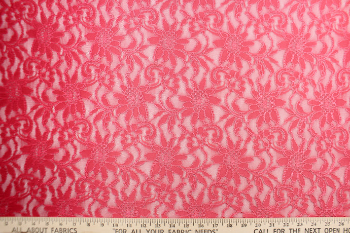 This lace features a floral design in a Ombre rich rose pink.