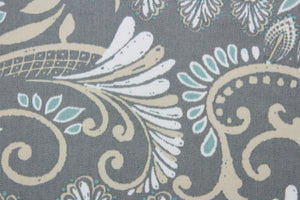 This Solarium outdoor decorative print features a large paisley design in white, turquoise and khaki against a gray background.  This versatile, long-lasting fabric can withstand up to 500 hours of sunlight, water and stain resistant and has 10,000 double rubs.  It is perfect for lounge cushions, pool furniture, tablecloths, decorative pillows and upholstery projects.  This fabric has a slightly stiff feel but is easy to work