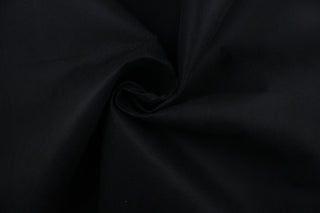 This is a felt fabric in solid black.  It features a slightly textured feel that is soft, sturdy and durable.  Uses include crafts, apparel accents, décor, embellishments and more. 