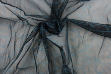 Load image into Gallery viewer, This lace with a unique design in a blue color against a black background . 
