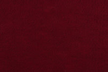 Load image into Gallery viewer, This is a felt fabric in solid garnet.  It features a slightly textured feel that is soft, sturdy and durable.  Uses include crafts, apparel accents, décor, embellishments and more. 
