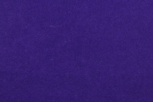  This is a felt fabric in solid purple.  It features a slightly textured feel that is soft, sturdy and durable.  Uses include crafts, apparel accents, décor, embellishments and more. 