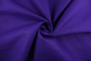  This is a felt fabric in solid purple.  It features a slightly textured feel that is soft, sturdy and durable.  Uses include crafts, apparel accents, décor, embellishments and more. 