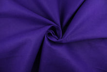 Load image into Gallery viewer,  This is a felt fabric in solid purple.  It features a slightly textured feel that is soft, sturdy and durable.  Uses include crafts, apparel accents, décor, embellishments and more. 
