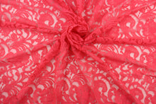 Load image into Gallery viewer, This lace features a floral design in a  hot coral pink with a stretch. 
