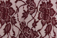 Load image into Gallery viewer,  This lace features a floral design in a burgundy with a stretch.
