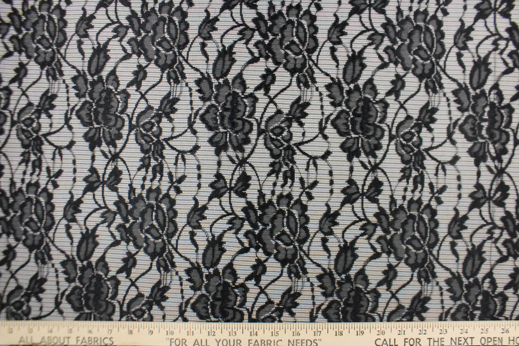 This lace features a floral design in black  .