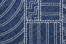 Load image into Gallery viewer,  Kathu is an embroidered fabric featuring a geometrical design in midnight blue and white.  It is stable and durable with 18,000 double rubs.  Uses include drapery, pillows, light upholstery, table runners, bedding, headboards, home décor and apparel. 
