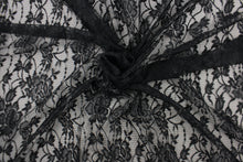 Load image into Gallery viewer, This lace features a floral design in black  .
