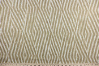  Biscayne is a multi purpose contemporary design in sand and light beige with a soil and stain resistant finish.  The versatile fabric is perfect for window accents (draperies, valances, curtains and swags) cornice boards, accent pillows, bedding, headboards, cushions, ottomans, slipcovers and upholstery.  It has a soft workable feel yet is stable and durable with 15,000 double rubs.  