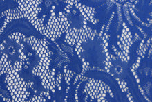 Load image into Gallery viewer, This lace features a floral design in a rich blue with a stretch.
