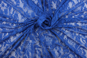 This lace features a floral design in a rich blue with a stretch.