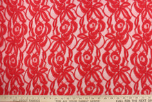 Load image into Gallery viewer, This lace features a floral design in a beautiful red tone  with a stretch. 
