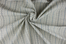 Load image into Gallery viewer, Bindu is a multi purpose fabric featuring a striped Aztec design.  The versatile fabric is perfect for window accents (draperies, valances, curtains and swags) cornice boards, accent pillows, bedding, headboards, cushions, ottomans, slipcovers and upholstery.  It has a soft workable feel yet is stable and durable.  Colors included are navy blue, charcoal gray and stone.
