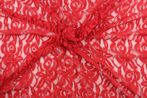 This lace features a floral design in a beautiful red tone  with a stretch. 