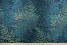Load image into Gallery viewer,  Fern Garden is a multi use jacquard fabric featuring a large scale fern design in deep sea green with gold metallic highlights.  It is durable with 27,000 double rubs and would be great for light upholstery, bedding, cornice boards, accent pillows and window treatments
