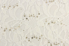 Load image into Gallery viewer, This lace features a floral sequin design in a white with a stretch.
