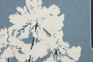 Serenity features large fluffy flowers in ivory and dark blue stalks set against a blue-gray background.  The multi use fabric is perfect for window treatments, decorative pillows, custom cushions, bedding, upholstery applications and almost any craft project.  This fabric has a soft workable feel yet is stable and durable.