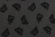 Load image into Gallery viewer, This lace features a butterfly design in black  with a stretch.
