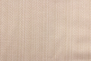 This beautiful champagne color with a hint of a pink undertone fabric features a herringbone design. 