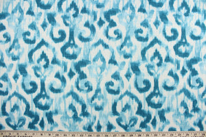  Sariya features a slubby basket print with washed ikat design in turquoise against a white background with a stain resistant finish.  It can be used for several different statement projects including window accents (drapery, curtains and swags), decorative pillows, hand bags, bed skirts, duvet covers, upholstery and craft projects.  It has a soft workable feel yet is stable and durable with 20,000 double rubs.
