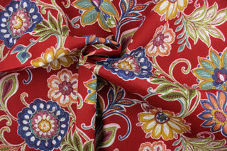 This fabric features a large floral design and is perfect for any project where the fabric will be exposed to the weather.  Able to resist stains and water, and has a rating of 10,000 double rubs, UV tested and can withstand 500 hours of direct sunlight.  Uses include cushions, tablecloths, upholstery projects, decorative pillows and craft projects. This fabric has a slightly stiff feel but is easy to work with.  Colors included are navy blue, olive green, red, berry pink, gold and white.