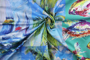 This fabric features a sail boat, fish , and palm tree in vibrant red, blue, green, purple, turquoise, teal, black and white.