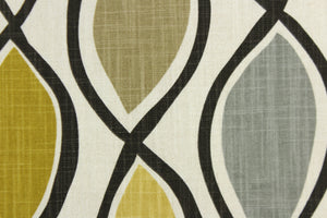 This fabric features a geometric design in mustard yellow, gray, taupe, off white and black. 