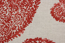 Load image into Gallery viewer, This fabric features a large scale paisley design in red against a stone background.  The multi use fabric is perfect for window treatments, decorative pillows, custom cushions, bedding, upholstery applications and almost any craft project.  This fabric has a soft workable feel yet is stable and durable with 12,000 double rubs.
