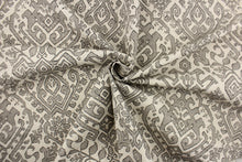 Load image into Gallery viewer, This fabric features an Aztec design in gray, black and natural. 
