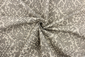 This fabric features an Aztec design in gray, black and natural. 
