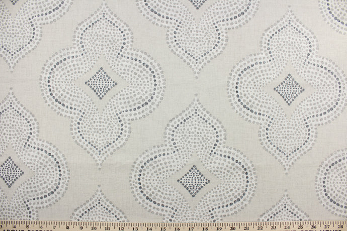 This fabric features a fun geometric print design.  The versatile fabric is perfect for window accents (draperies, valances, curtains and swags) cornice boards, accent pillows, bedding, headboards, cushions, ottomans, slipcovers and upholstery.  It has a soft workable feel yet is stable and durable with 50,000 double rubs.  Colors include grey, crème, putty and sand beige.