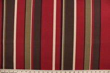 Load image into Gallery viewer, Monserrat is an outdoor fabric featuring multi width stripes in shades of brown, beige and dark red.  It is perfect for outdoor settings or indoors in a sunny room.  Solarium fabrics can withstand up to 500 hours of sunlight, water and stain resistant and has a rating of 10,000 double rubs.  Uses include toss pillows, cushions, upholstery, pool furniture, tote bags and more.
