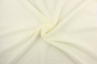 A sheer fabric  in a off white cream .