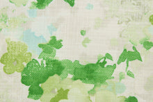 Load image into Gallery viewer, Fleurie is a multipurpose, watercolor, floral design on a linen and cotton print cloth with woven small basket weaves that add texture to the design.  Colors included are shades of green, light blue, light taupe and antique white. 
