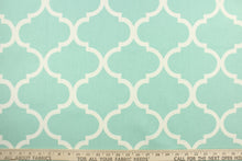 Load image into Gallery viewer, This fabric features a geometric lattice design in spa blue . 
