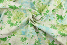 Load image into Gallery viewer, Fleurie is a multipurpose, watercolor, floral design on a linen and cotton print cloth with woven small basket weaves that add texture to the design.  Colors included are shades of green, light blue, light taupe and antique white. 
