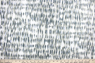 Tonga is a chenille high end upholstery weight fabric that is suited for uses that requires a more durable fabric.  It it great for upholstery projects including sofas, chairs, dining chairs, pillows, drapery, accent pillows and craft projects.  It would be a beautiful accent to any room.  Colors included are dark gray and ivory with iridescent accents.   